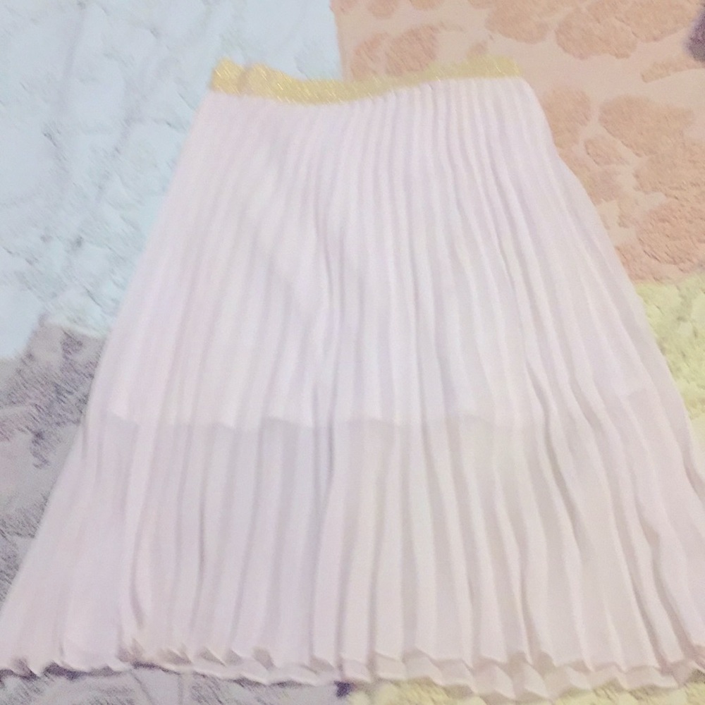 White pleated skirt